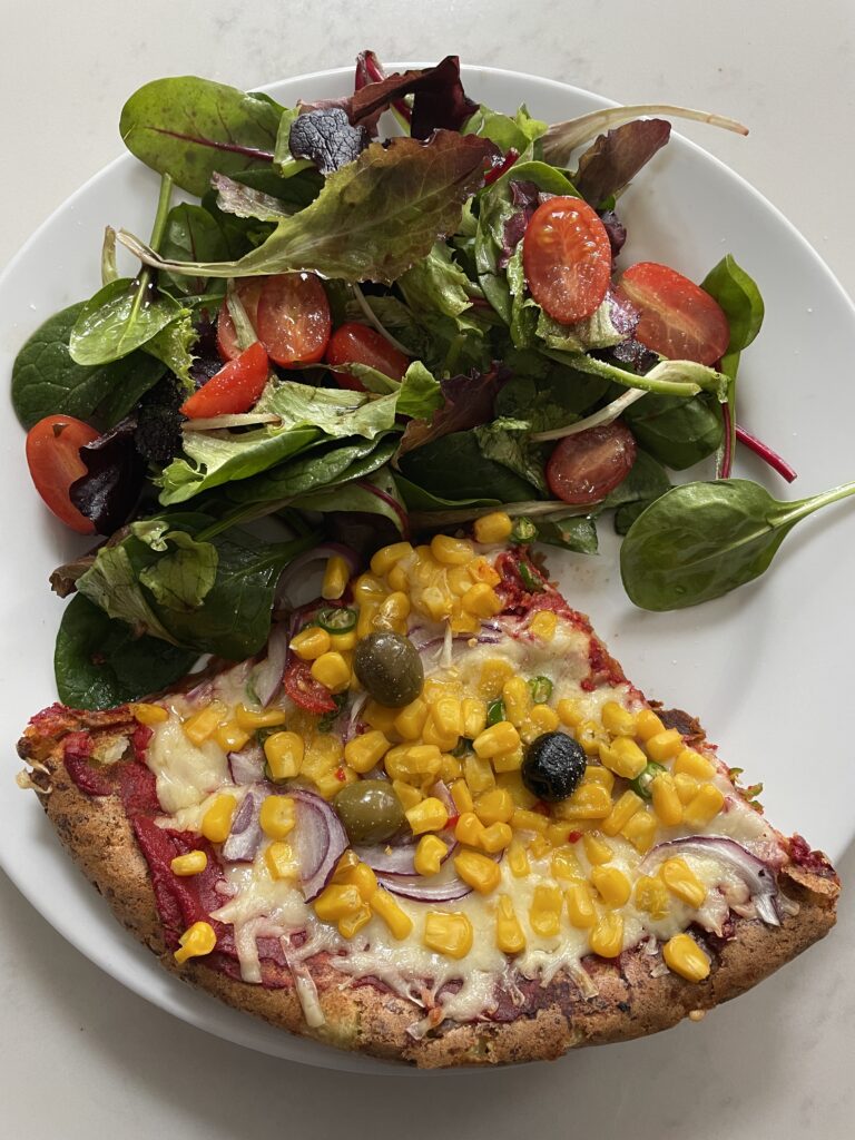 slice of syn free pizza and a salad